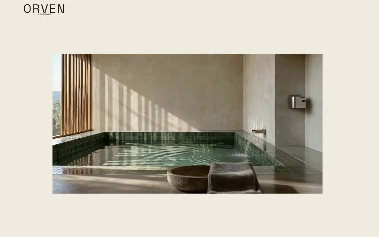 Orven Interiors identity mark above the Tidal Room interior.